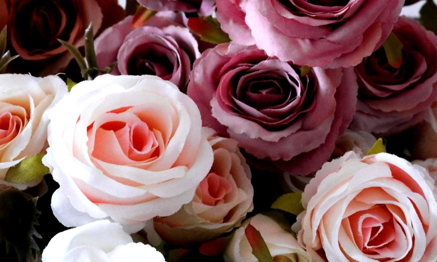 Instructor demonstrating advanced floral composition techniques